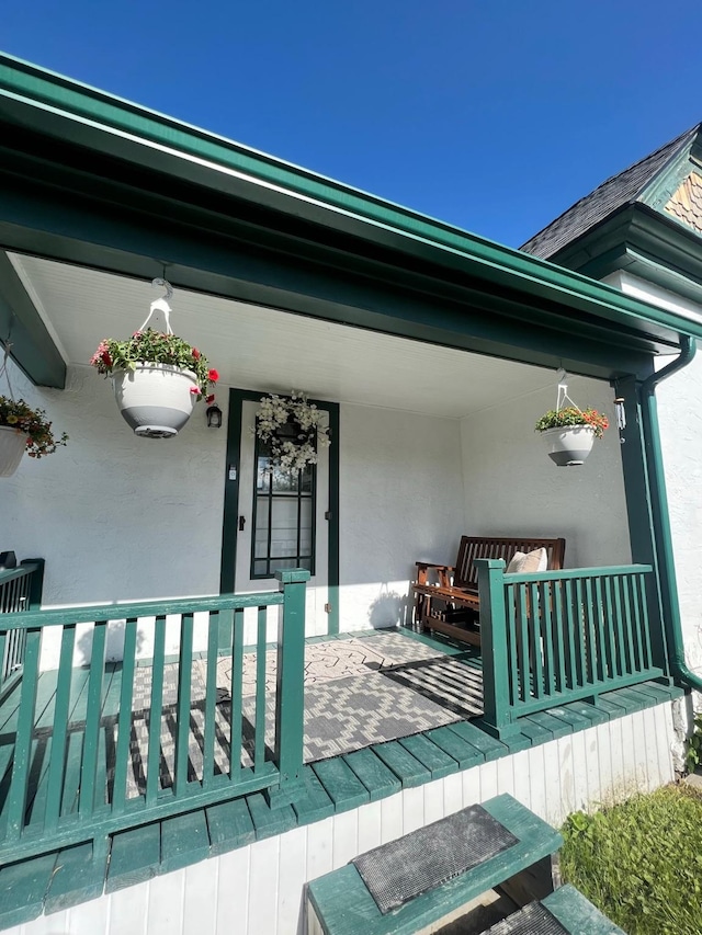 wooden deck with a porch