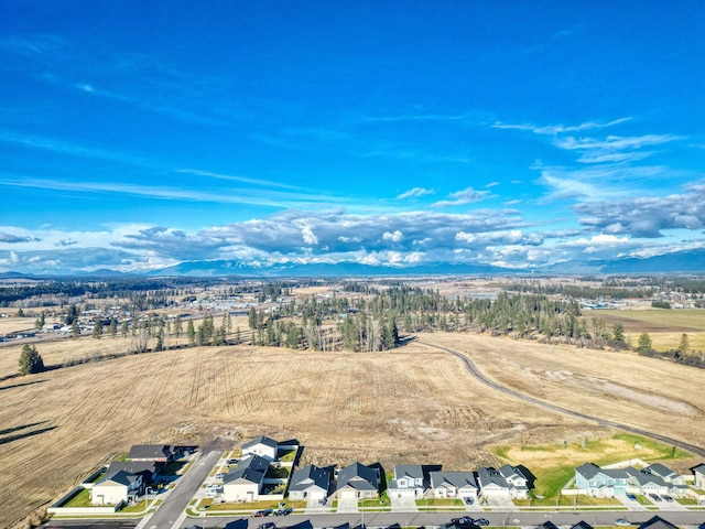 drone / aerial view featuring a mountain view