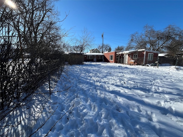 view of yard covered in snow