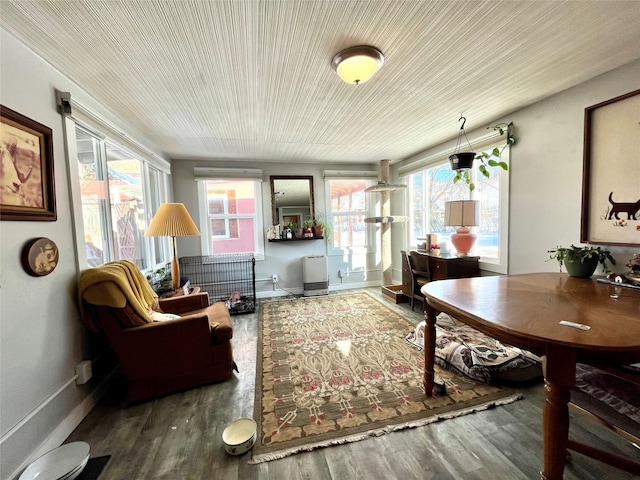 sunroom / solarium featuring a healthy amount of sunlight