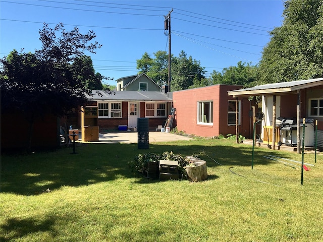 view of yard with a patio area