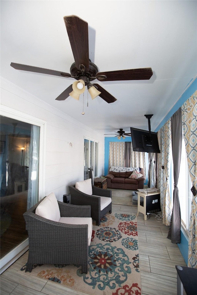 living room with ornamental molding