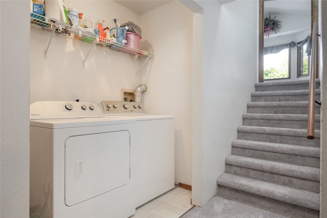 washroom featuring washing machine and dryer