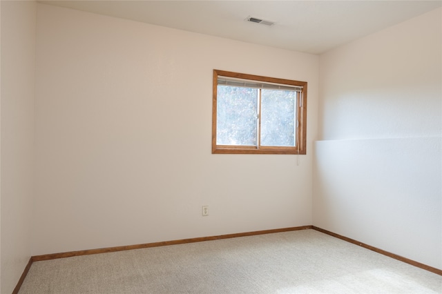 unfurnished room with carpet