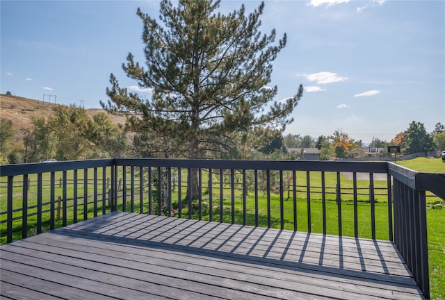 deck featuring a lawn