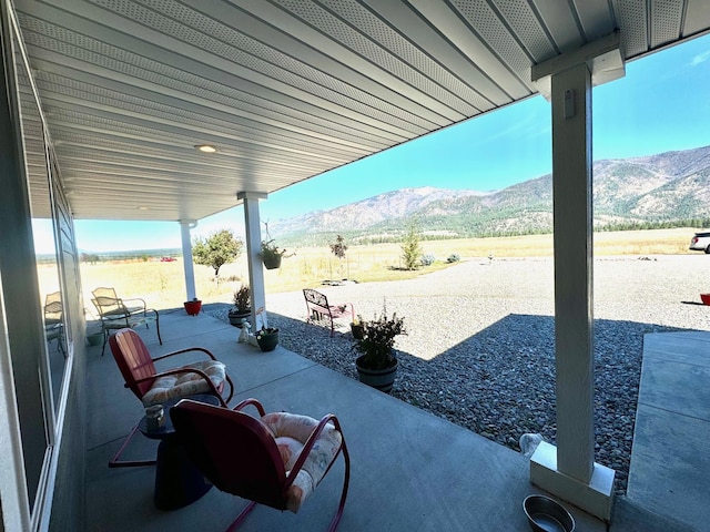 view of patio with a mountain view