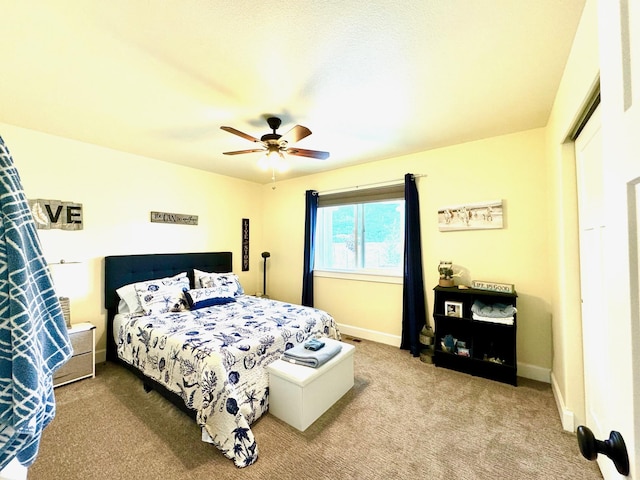 66 Moccasin Ln, Thompson Falls, MT 59873 - bedroom featuring carpet flooring, a ceiling fan, and baseboards