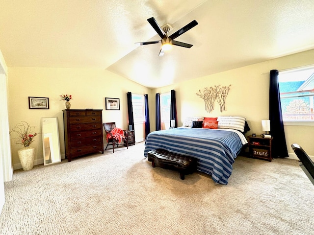 66 Moccasin Ln, Thompson Falls, MT 59873 - bedroom featuring carpet floors, vaulted ceiling, and a ceiling fan