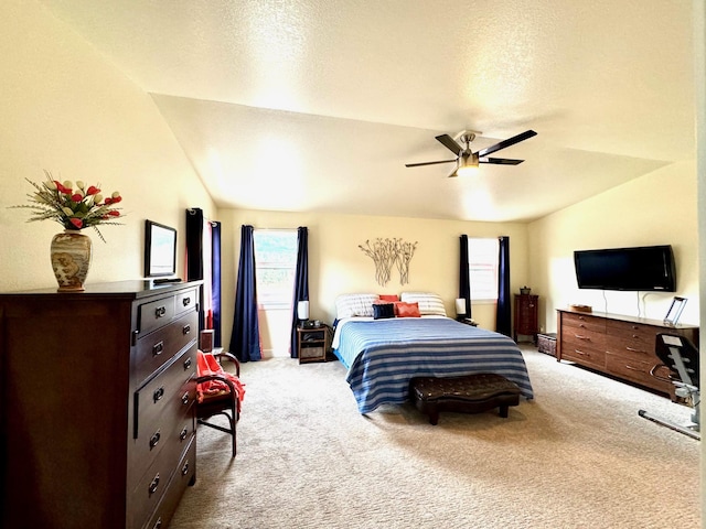 66 Moccasin Ln, Thompson Falls, MT 59873 - bedroom with vaulted ceiling, carpet, and ceiling fan
