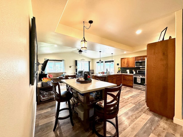 66 Moccasin Ln, Thompson Falls, MT 59873 - dining area with plenty of natural light, light wood-style flooring, ceiling fan, a textured wall, and recessed lighting