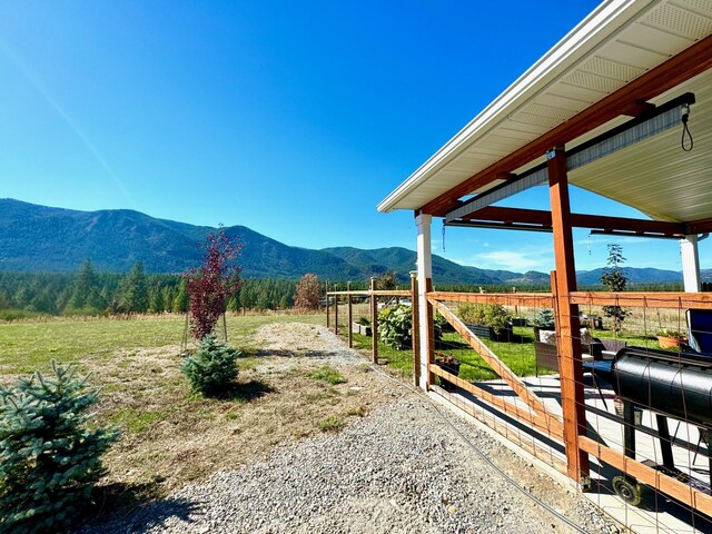 66 Moccasin Ln, Thompson Falls, MT 59873 - view of yard featuring a mountain view and a rural view