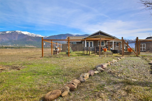 66 Moccasin Ln, Thompson Falls, MT 59873 - back of house featuring a mountain view