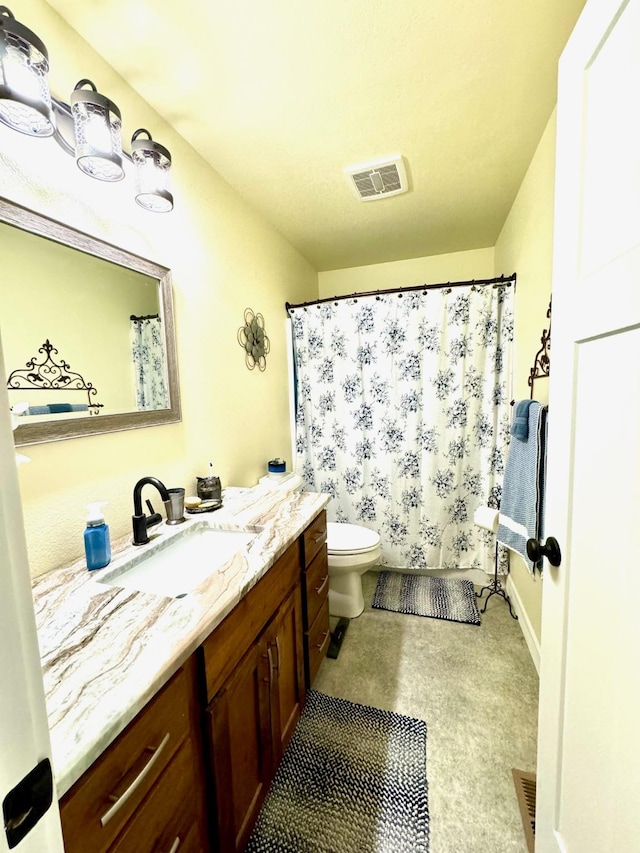 66 Moccasin Ln, Thompson Falls, MT 59873 - full bath featuring vanity, toilet, and a shower with curtain