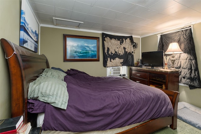 bedroom with crown molding