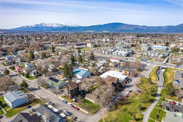 birds eye view of property featuring a mountain view