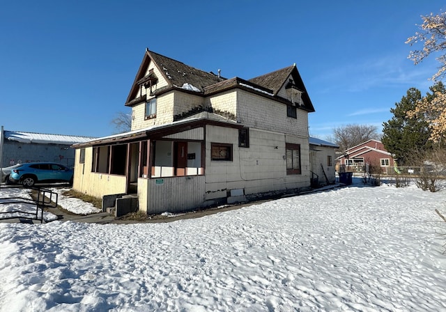 view of snow covered property