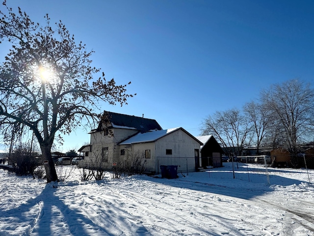 view of snow covered property