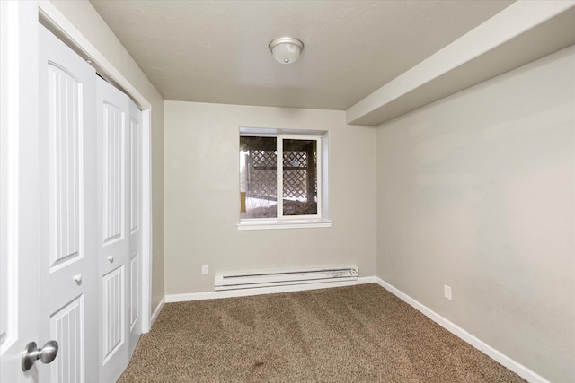 6 Parkway Dr Unit A & B, Kalispell, MT 59901 - unfurnished bedroom featuring baseboard heating, carpet floors, and a closet