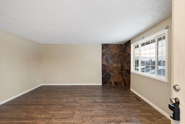 6 Parkway Dr Unit A & B, Kalispell, MT 59901 - unfurnished room featuring wood finished floors and a textured ceiling