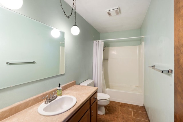 full bathroom with tile patterned flooring, vanity, toilet, and shower / bath combo with shower curtain