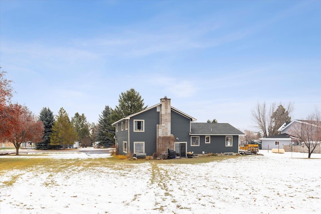 view of snow covered property