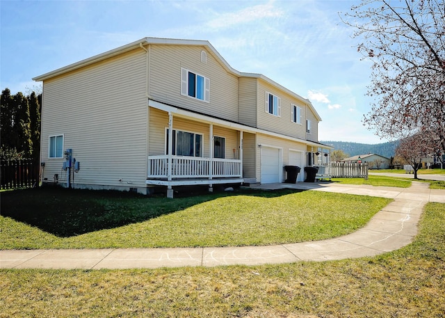 1888 N Belmar Dr, Kalispell, MT 59901 - view of front of house featuring a porch, driveway, and an attached garage