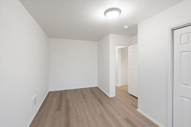 1888 N Belmar Dr, Kalispell, MT 59901 - unfurnished bedroom with light wood finished floors and baseboards