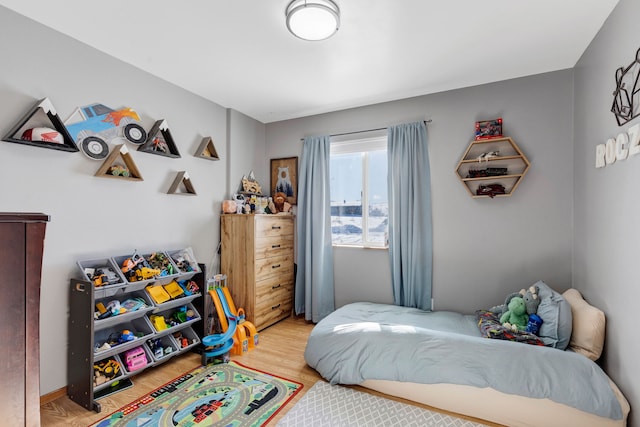 bedroom featuring light hardwood / wood-style floors