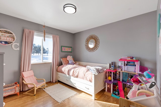 bedroom featuring hardwood / wood-style flooring