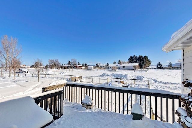 view of snow covered deck