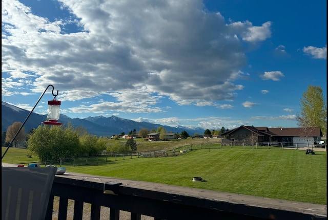 view of mountain feature with a rural view