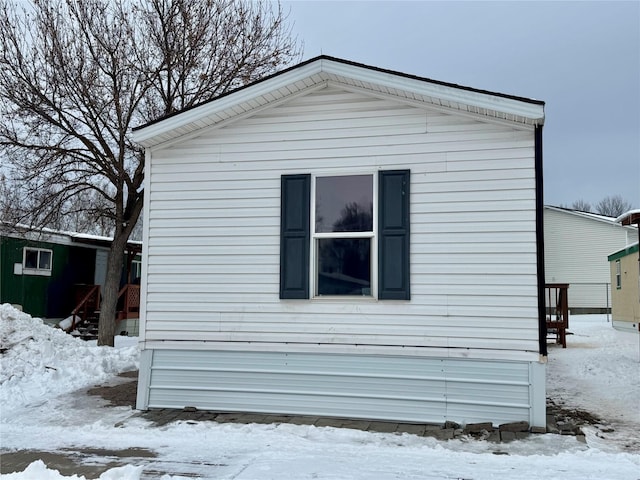 view of snow covered property