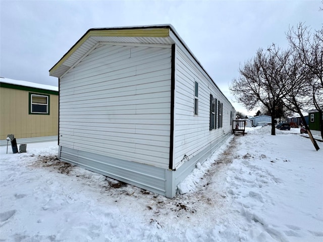 view of snow covered property