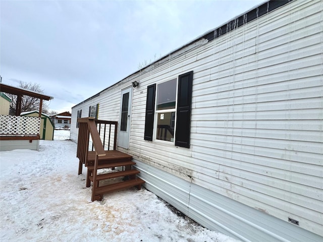 view of snow covered property