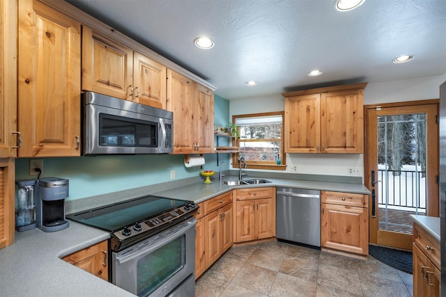 kitchen featuring appliances with stainless steel finishes and sink