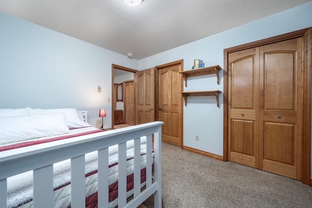 bedroom featuring light carpet