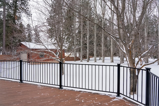 view of snow covered deck