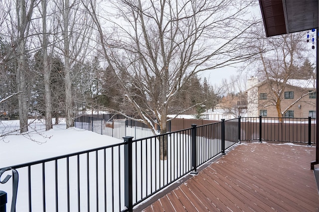 view of snow covered deck