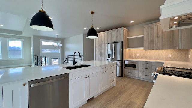 7018 Max Dr, Missoula, MT 59803 - kitchen with recessed lighting, open shelves, light countertops, a sink, and appliances with stainless steel finishes