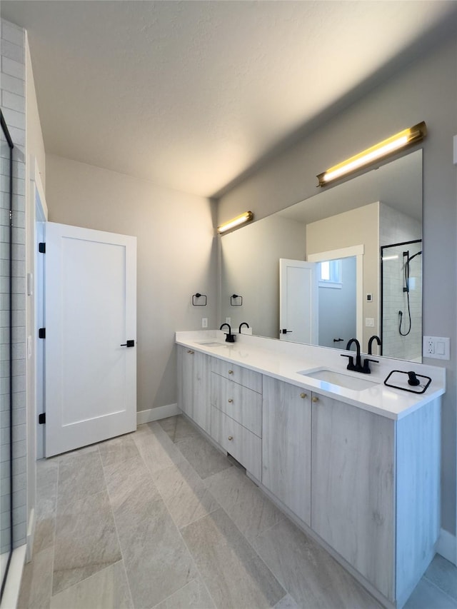 7018 Max Dr, Missoula, MT 59803 - bathroom with baseboards, double vanity, a stall shower, and a sink