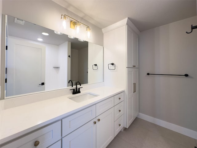 7018 Max Dr, Missoula, MT 59803 - bathroom with tile patterned floors, baseboards, and vanity
