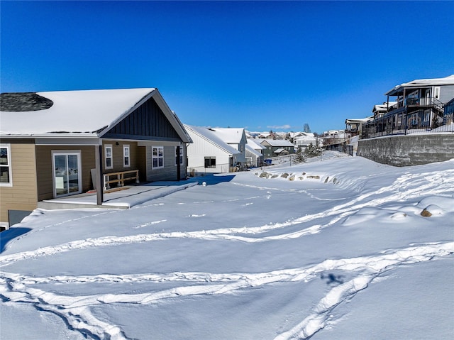 view of yard covered in snow