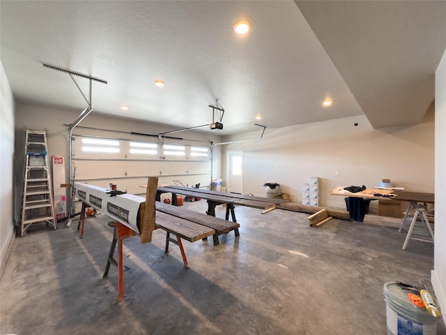 7018 Max Dr, Missoula, MT 59803 - interior space featuring concrete flooring, recessed lighting, and a garage