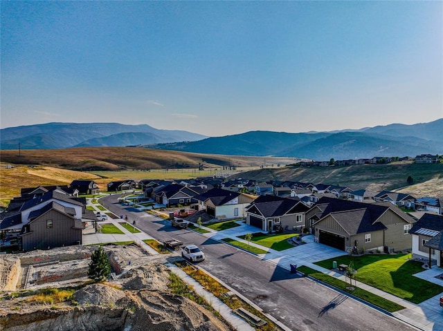 drone / aerial view featuring a mountain view