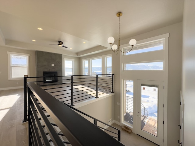 7018 Max Dr, Missoula, MT 59803 - foyer entrance featuring baseboards, a raised ceiling, and a healthy amount of sunlight