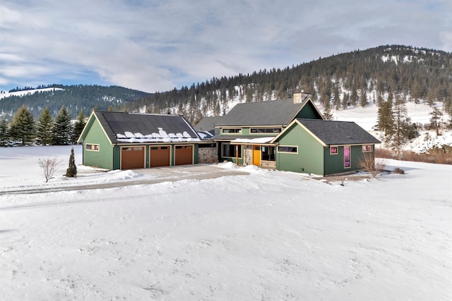 view of front of house with a mountain view