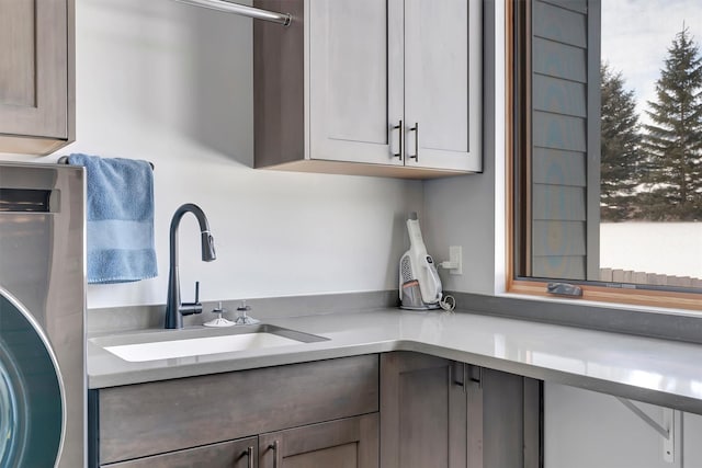 kitchen with sink and a wealth of natural light