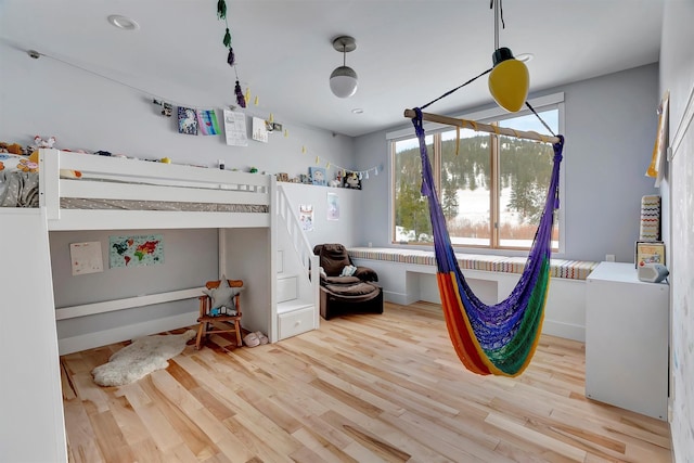 bedroom with light wood-type flooring