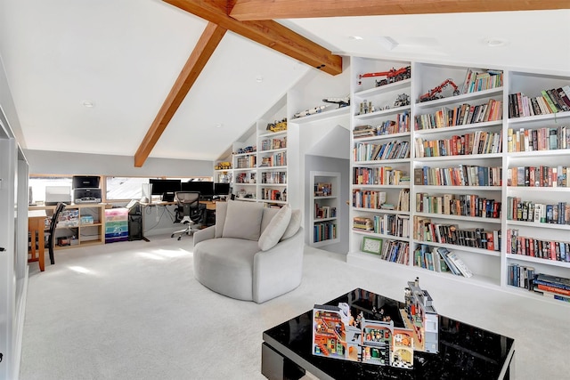 interior space with vaulted ceiling with beams and carpet flooring