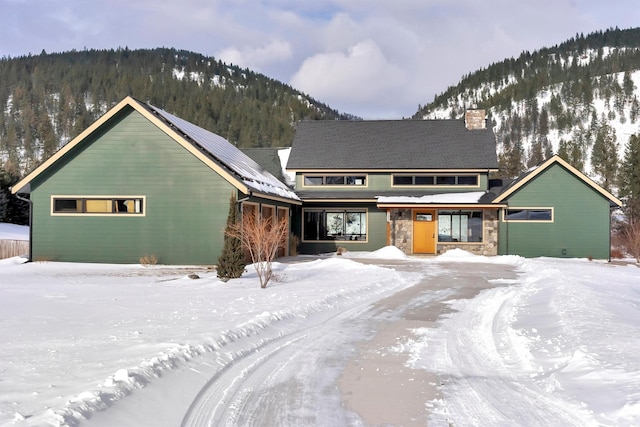 view of front of house with a mountain view